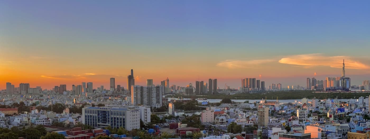 Panorama of a developing Ho Chi Minh City, Vietnam (evening view)